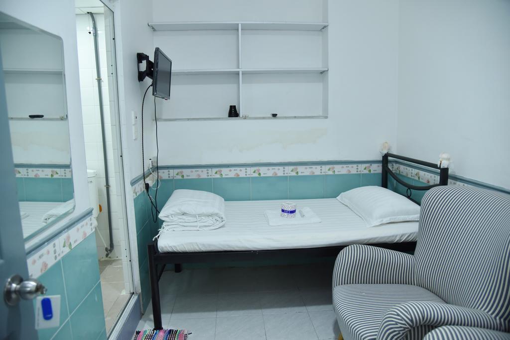 Jas Guest House Хонконг Стая снимка