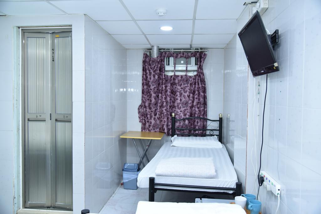 Jas Guest House Хонконг Стая снимка