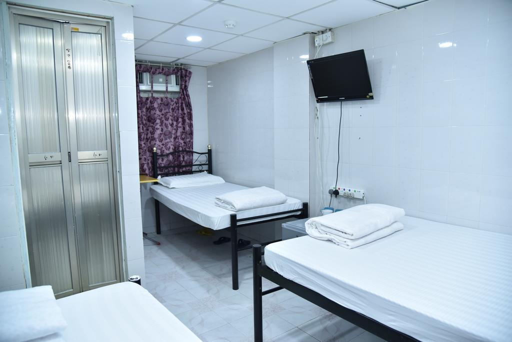 Jas Guest House Хонконг Стая снимка